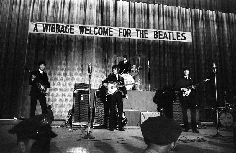The Beatles perform onstage at Convention Hall in Philadelphia during their first U.S. tour on Sept. 2, 1964