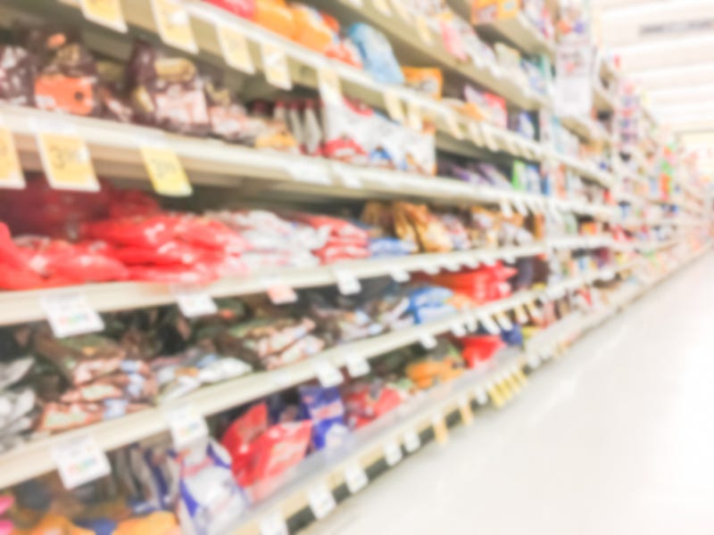 Candy aisle at convenience store stock photo. 