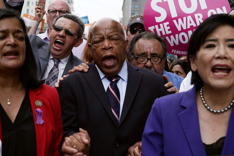  U.S. Rep. Pramila Jayapal (D-WA), President of CASA in Action Gustavo Torres, Rep. John Lewis (D-GA), Rep. Raul Grijalva (D-AZ) and Rep. Judy Chu (D-CA) march to the headquarters of U.S. Customs and Border Protection during a protest June 13, 2018 in Washington, DC. Democratic congressional members joined actives to protest "the Trump administration's policy to separate children from their parents at the border." (Photo by Alex Wong/Getty Images)