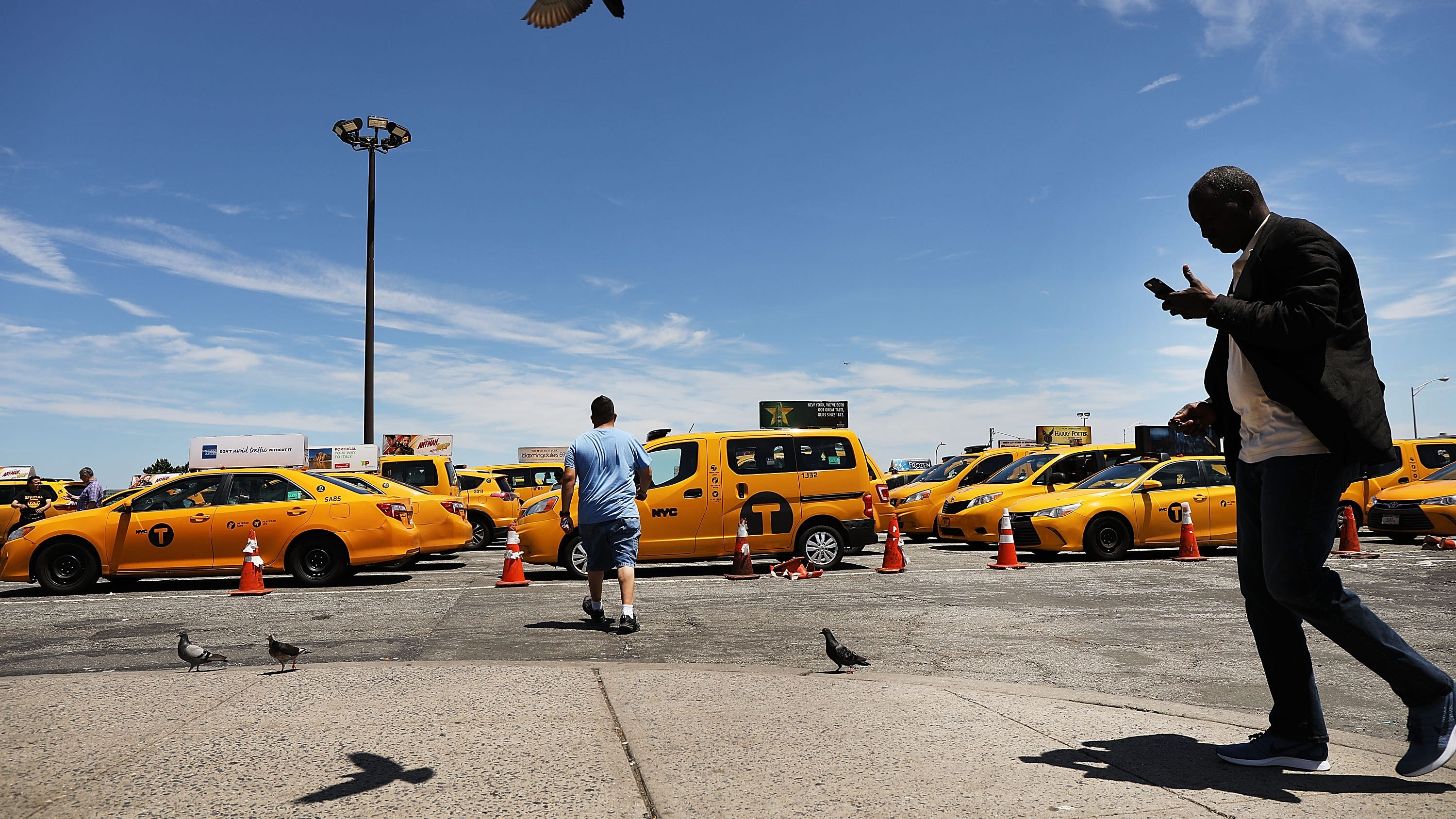 2 Queens men arrested for hacking JFK taxi dispatch to skip drivers in pick-up line for cash