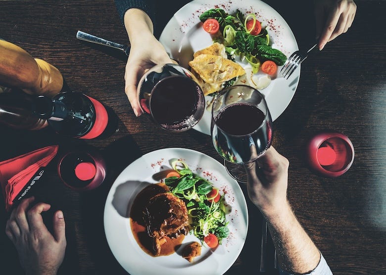 Couple enjoying a romantic steak dinner