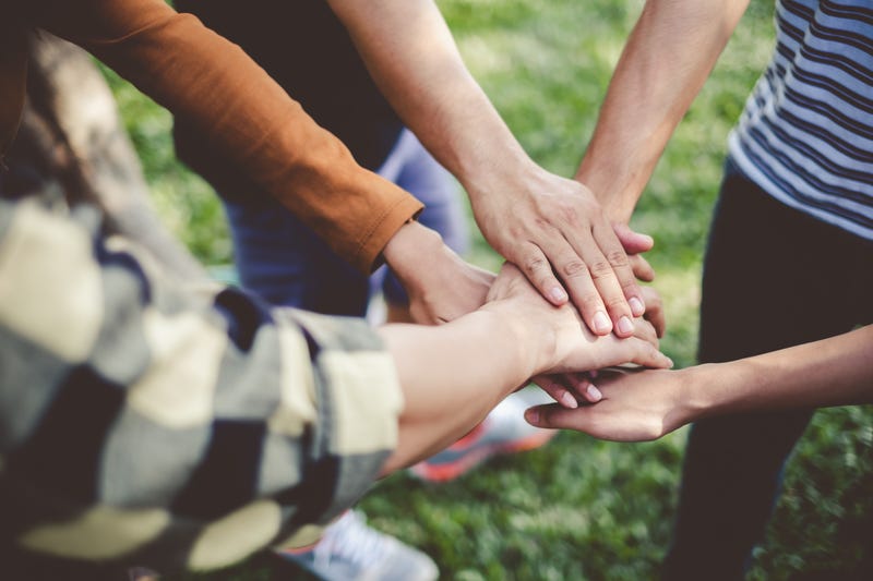Hands together in teamwork