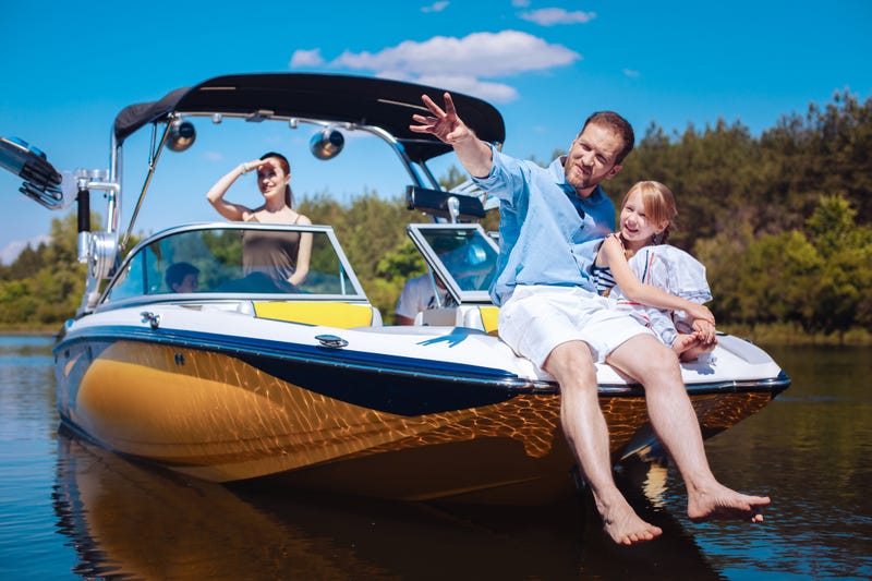 Family on boat - File Photo