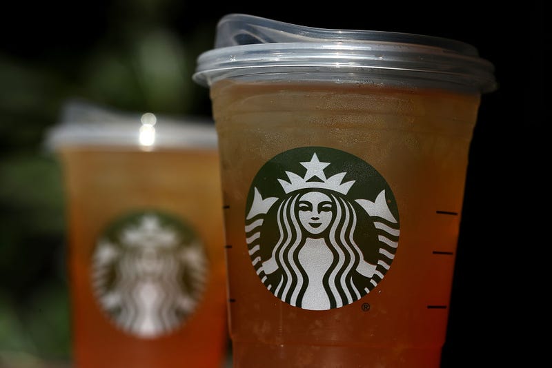 A new flat plastic lid that does not need a straw is shown on a cup of Starbucks iced tea on July 9, 2018 in Sausalito, California.