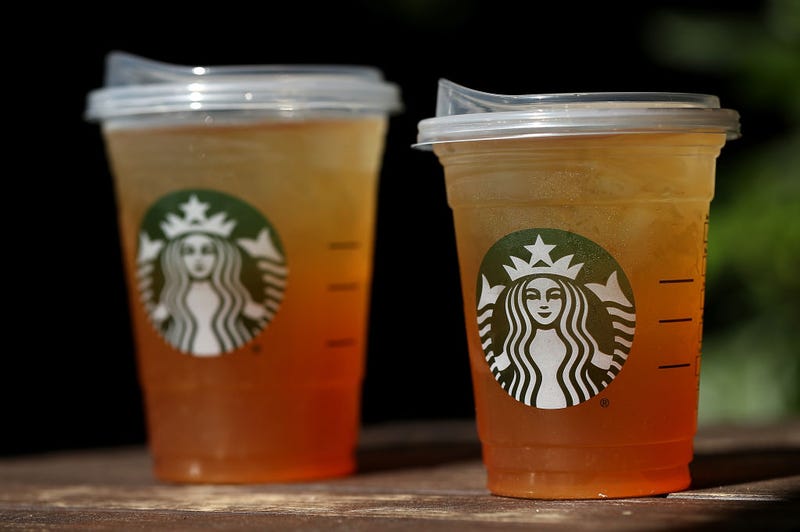A new flat plastic lid that does not need a straw is shown on a cup of Starbucks iced tea on July 9, 2018 in Sausalito, California. 