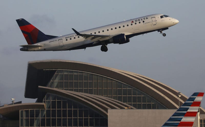 FILE - A Delta plane takes off from Los Angeles International Airport on July 12, 2018 in Los Angeles.