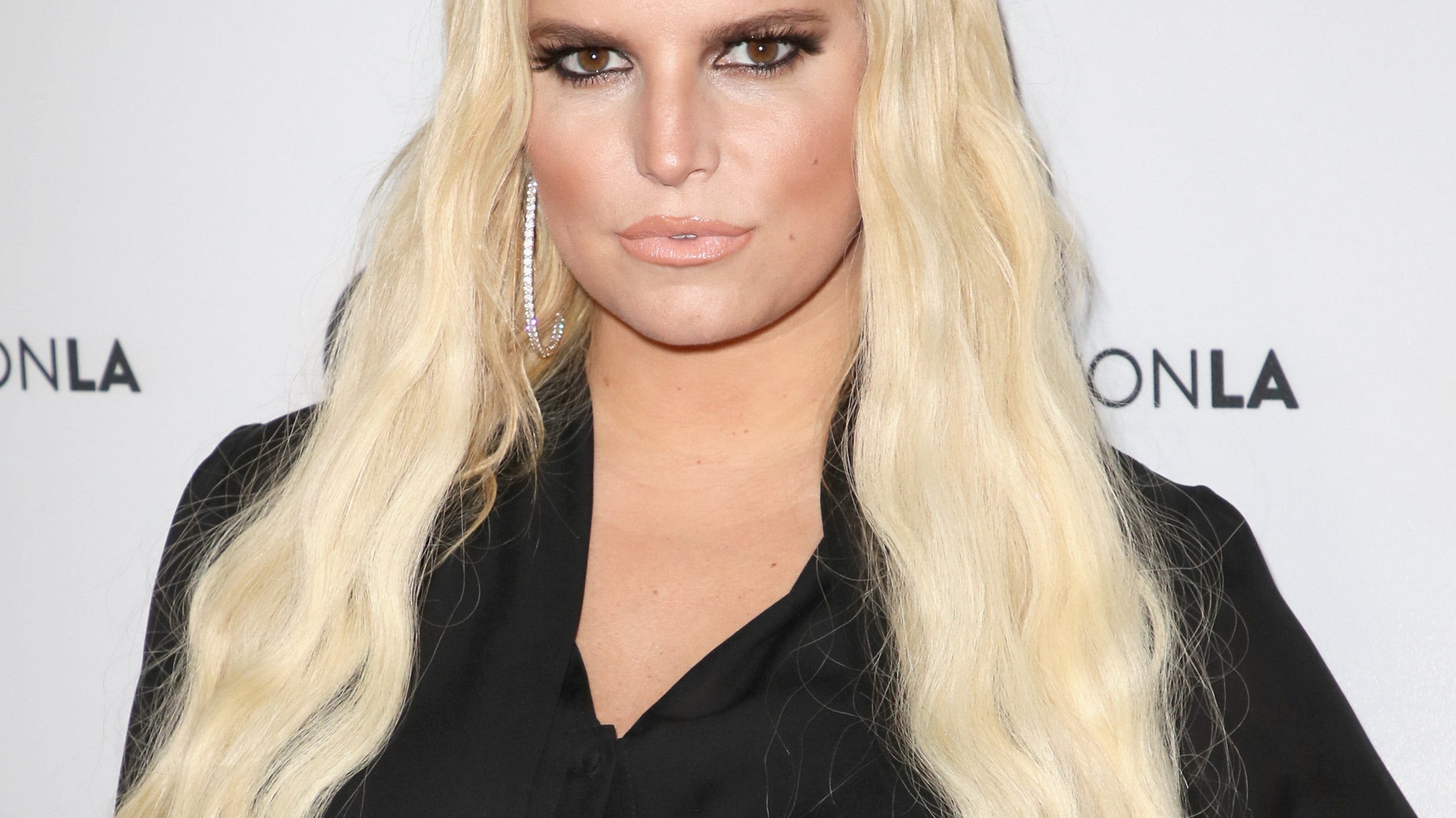 Jessica Simpson, 42, breaks out beautiful, belted brown bikini