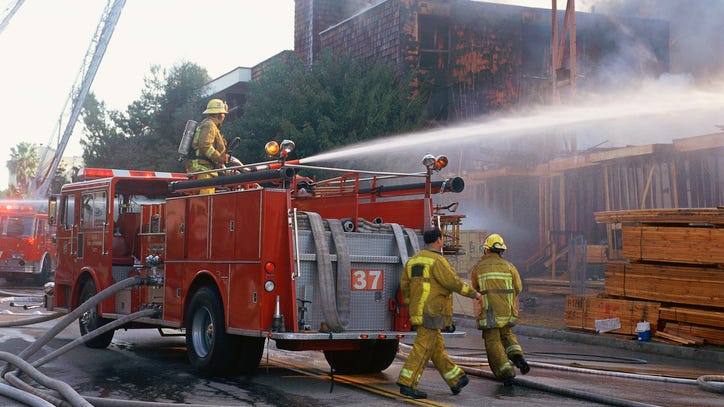 Flames were "shooting through the roof" as apartment fire burned in Farmington Hills