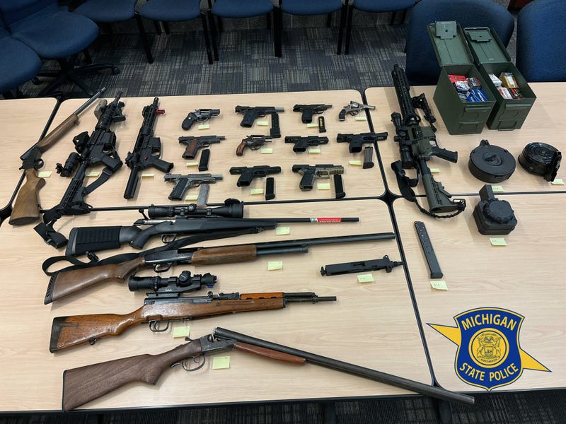 Guns lined up on a table