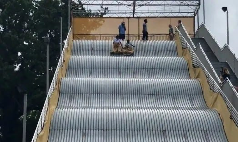 Riders on Belle Isle Giant Slide in Detroit