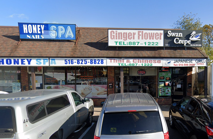 A Long Island man was arrested for punching an officer in the face at Ginger Flower Restaurant.