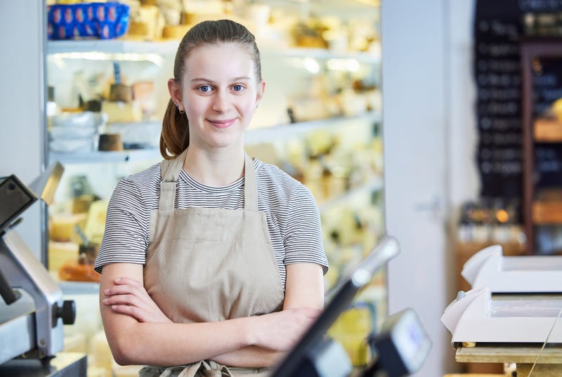 Teen girl working in a deli
