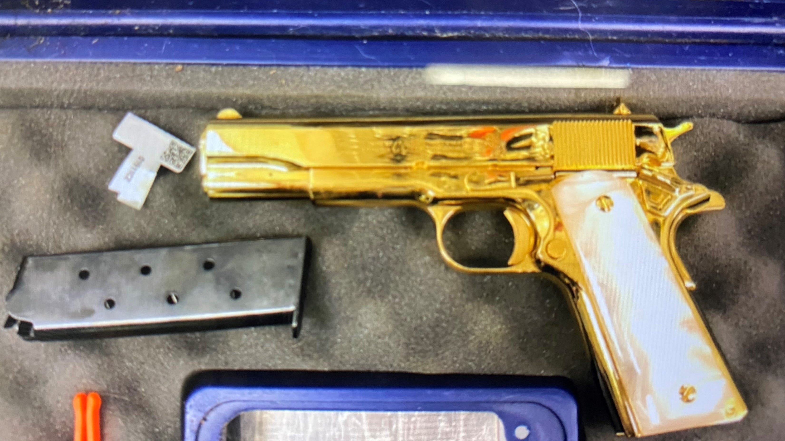 American woman arrested for trying to get into Australia with gold-plated gun