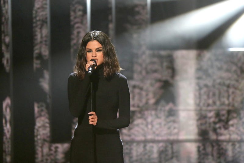  Selena Gomez performs onstage during the 2019 American Music Awards