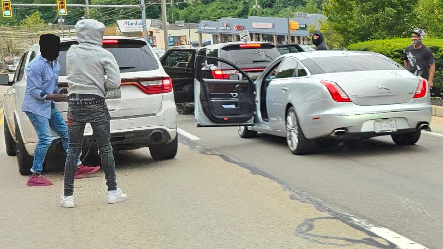 Carjacking caught on camera in broad daylight near Greentree Shopping Center