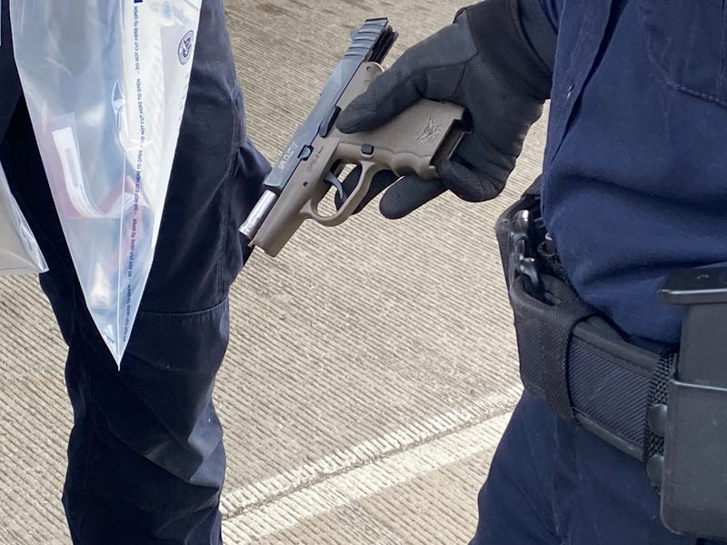 One commercial truck driver is behind bars after officers with the U.S. Customs and Border Protection caught him with loaded gun and drugs during an outbound inspection at the Ambassador Bridge on Friday.