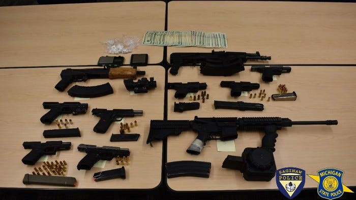 Authorities confiscated 10 illegal firearms along with cash and drugs from an address in Saginaw where one teen had been shot in the leg Wednesday evening.