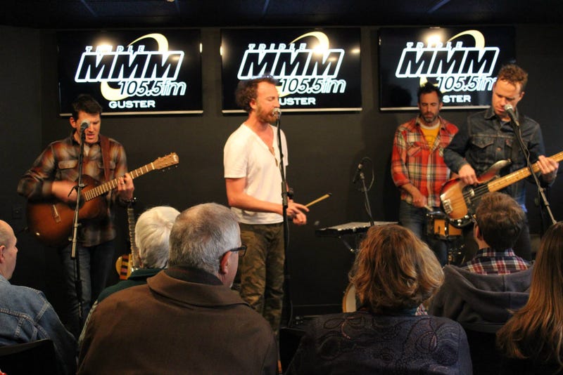Guster in Studio M with backs of audience members' heads