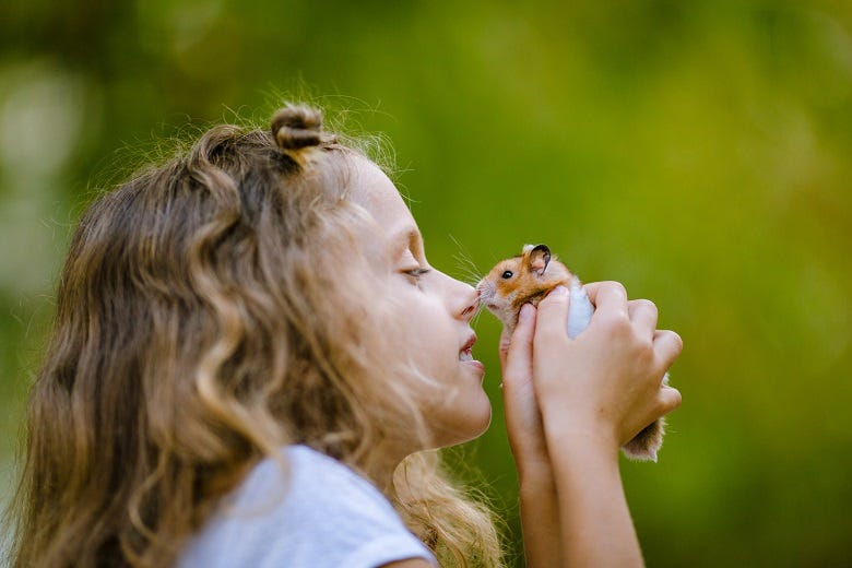 girl with hamster