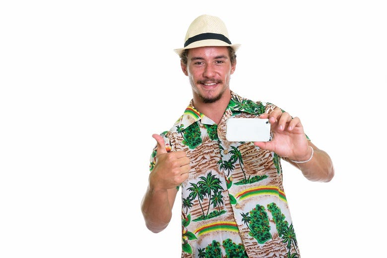 Guy wearing Hawaiian shirt
