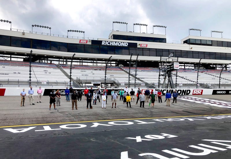 Henrico Principals and Administrators stand at Richmond Raceway