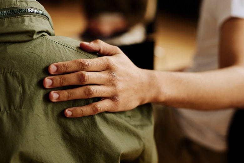 hand on back