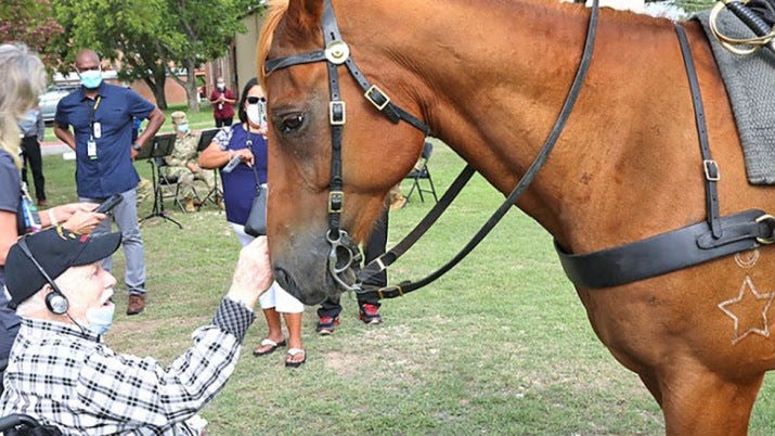 World War II Cavalry veteran celebrates 100th birthday with beloved horses