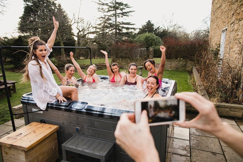 women in a hot tub