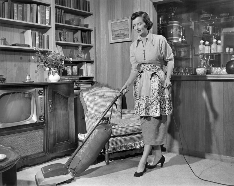 1950's housewife vaccuming