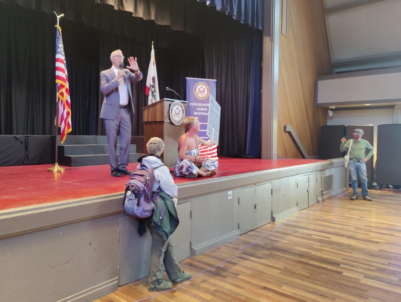 Anti-vaccine protestors storm a town hall held by Rep. Jared Huffman at the San Rafael Community Center on June 8, 2021.