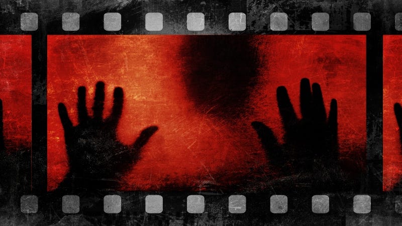 Scary film head hands shadow Getty Images