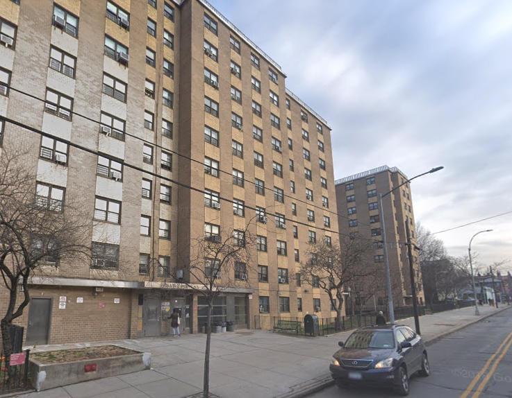 A woman attacked a man with a hammer at an apartment tower on Linden Place in Flushing on Monday night