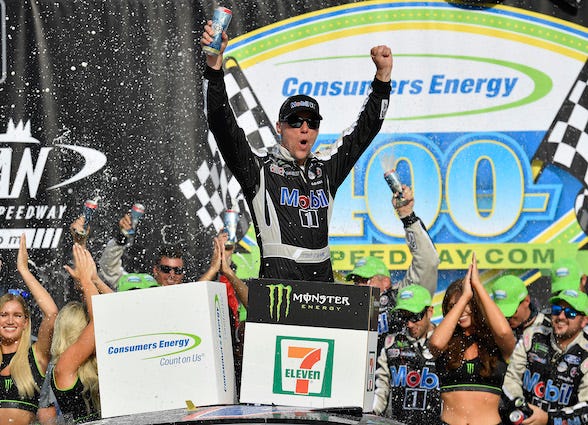 Stewart Haas Racing's Kevin Harvick Celebrates In Victory Lane At Michigan International Speedway