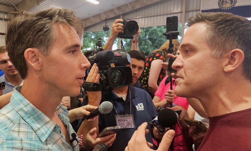 Republican U.S. Sen. Josh Hawley, left, confronts his Democratic challenger, Lucas Kunce, over who is ducking debates during a meeting Thursday, Aug. 15, 2024, at the Governor’s Ham Breakfast at the Missouri State Fair in Sedalia.