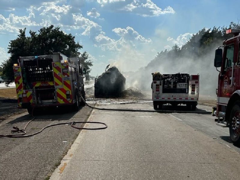 Dallas Fire-Rescue crews put out a trailer fire along Interstate 20 in southern Dallas County on Thursday, Sept. 7, 2023.