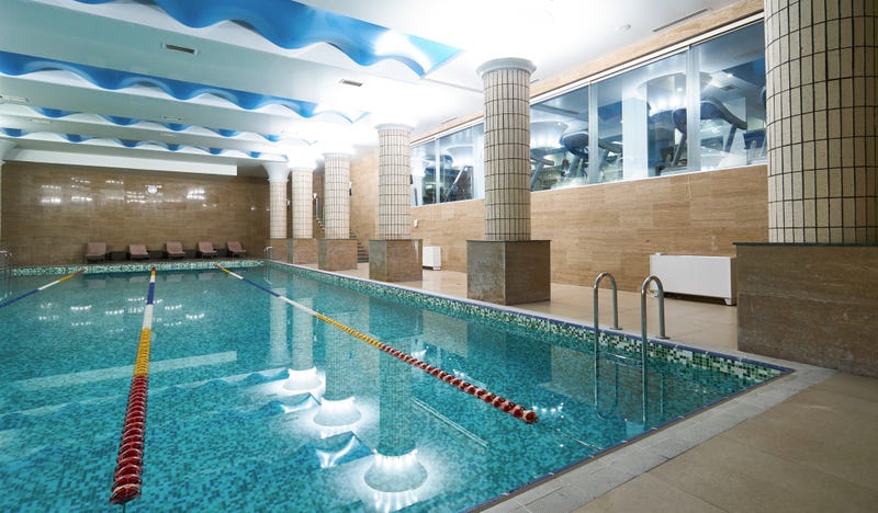 A swimming pool inside a health club