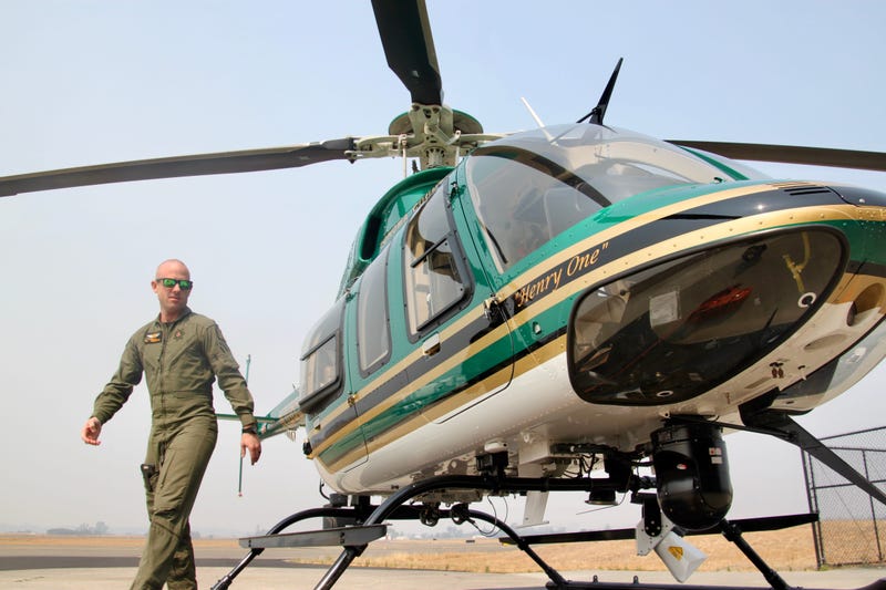 Sonoma County tactical flight officer Chris Haas with Henry 1.