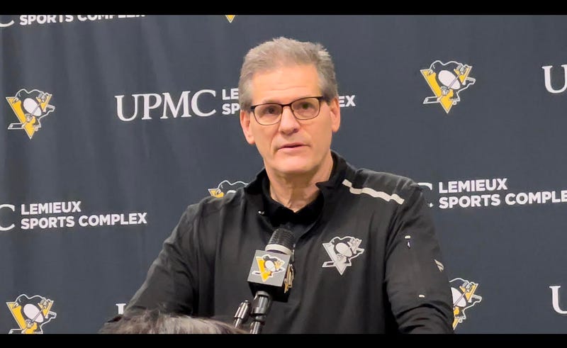 Ron Hextall at a podium
