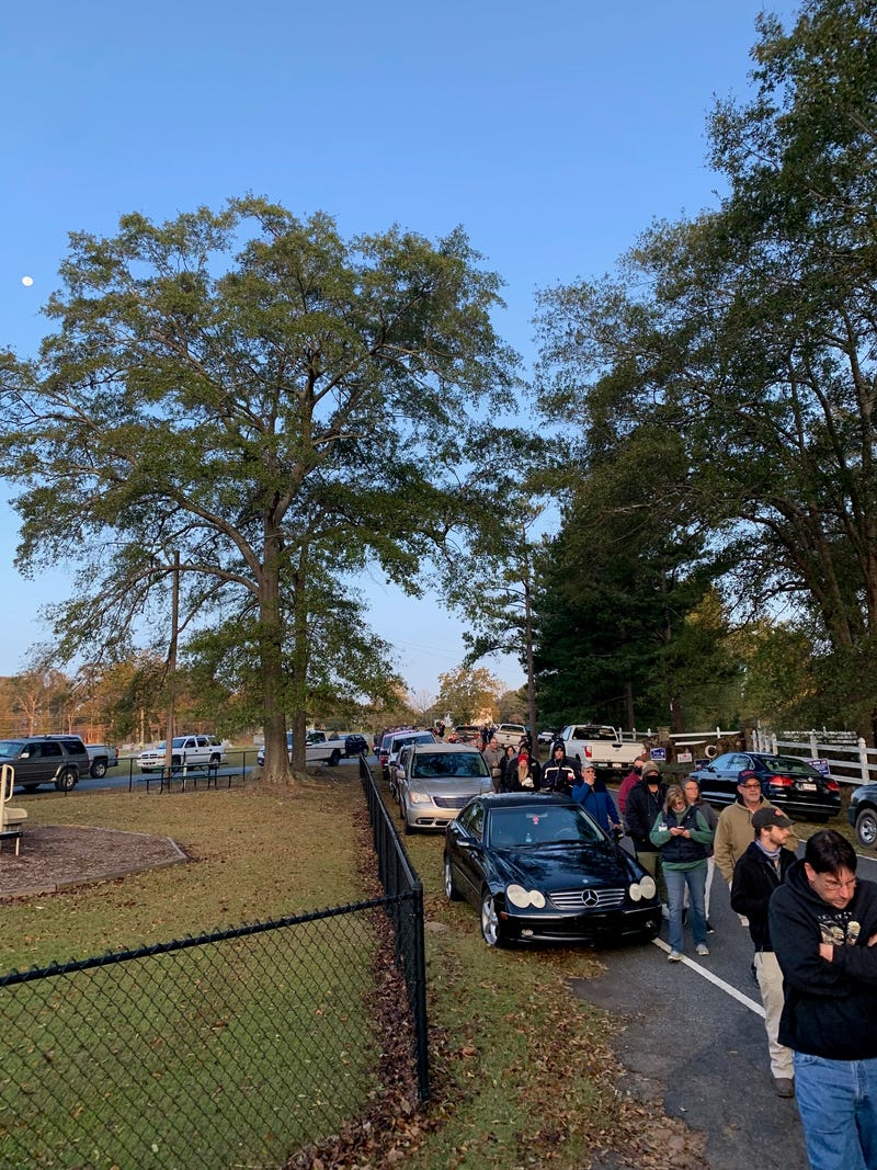 Voters line up to vote at the Holly Springs precinct 