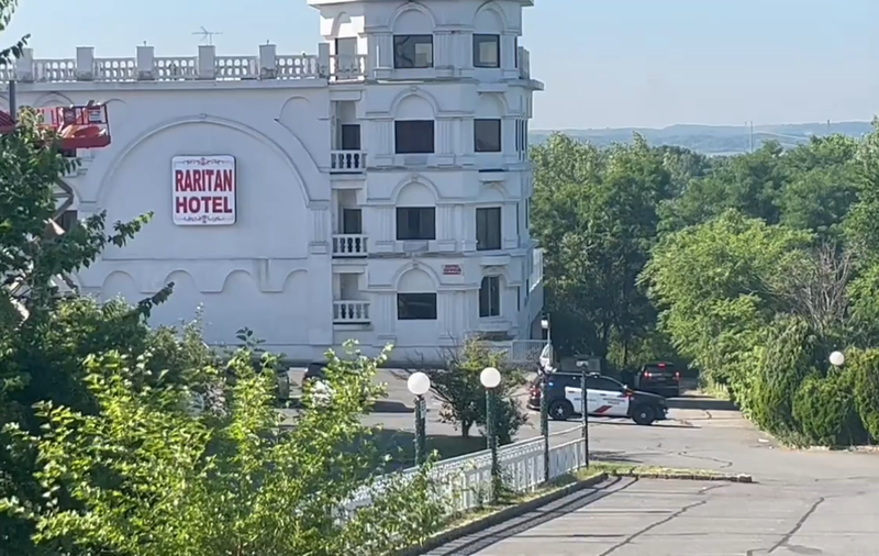 Authorities are investigating a police-involved shooting at the Raritan Hotel on Kings George Post Road in Woodbridge