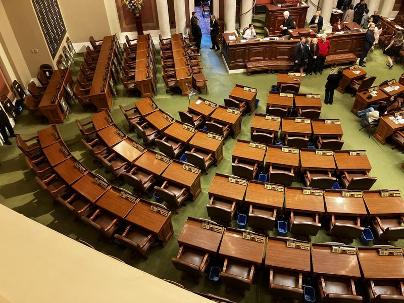 The empty DFL seats as the session began Tuesday in St. Paul.