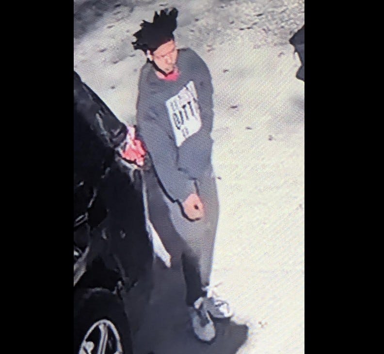 This is a current photo of the suspect, prior to fleeing.