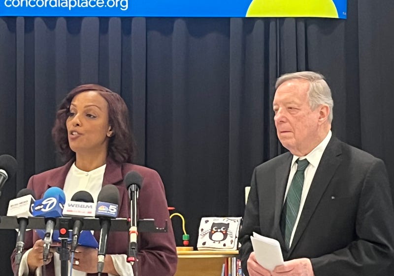 U.S. Sen. Dick Durbin (D-Illinois) looks on as Concordia House CEO Grace Araya talks to reporters Friday.