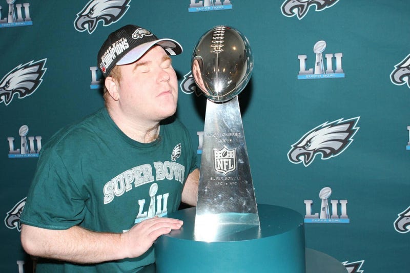 Mark Esposito posing with the Eagles Lombardi Trophy.