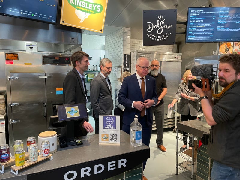 Governor Tim Walz addressing the potential catastrophic situation facing Minnesota small businesses Tuesday at The Market at Malcolm Yards.