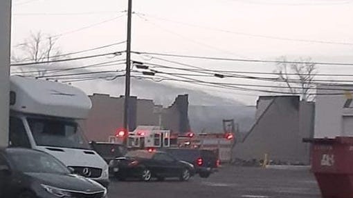 Madison Heights firefighters investigate 3-alarm fire that destroyed screen printing, embroidery business