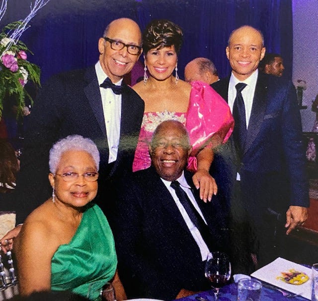 Henry and Billye Aaron (green dress) celebrate at a recent UNCF event. 