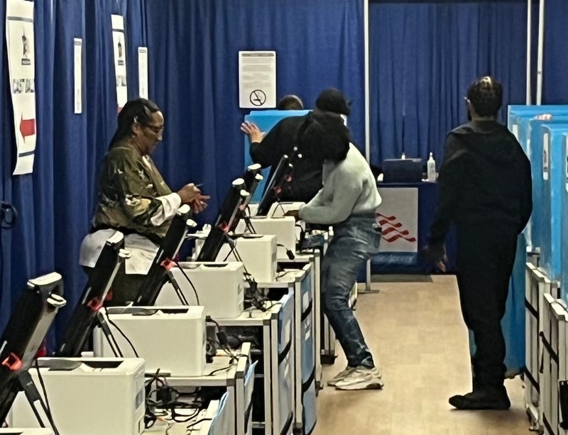 Workers at the Chicago Board of Elections voting supersite set up ballot machines ahead of the site's opening February 12. 