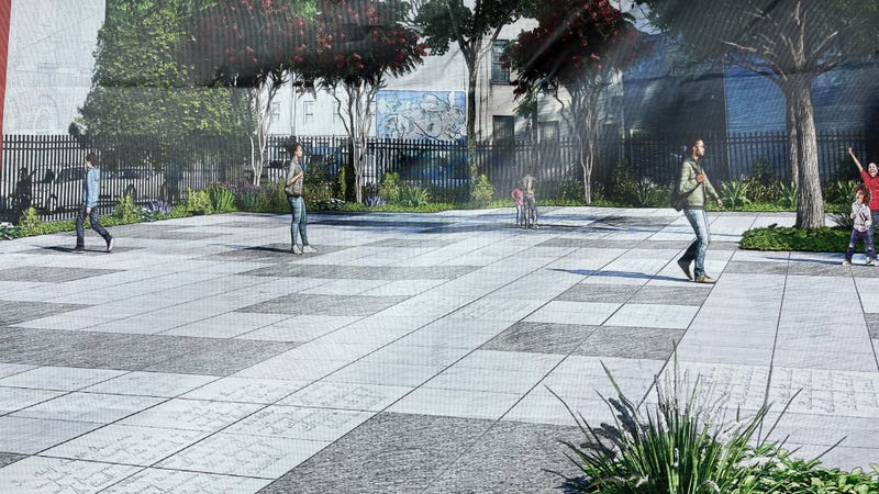 Photo of banner featuring rendering of Weccacoe Playground's redesign.