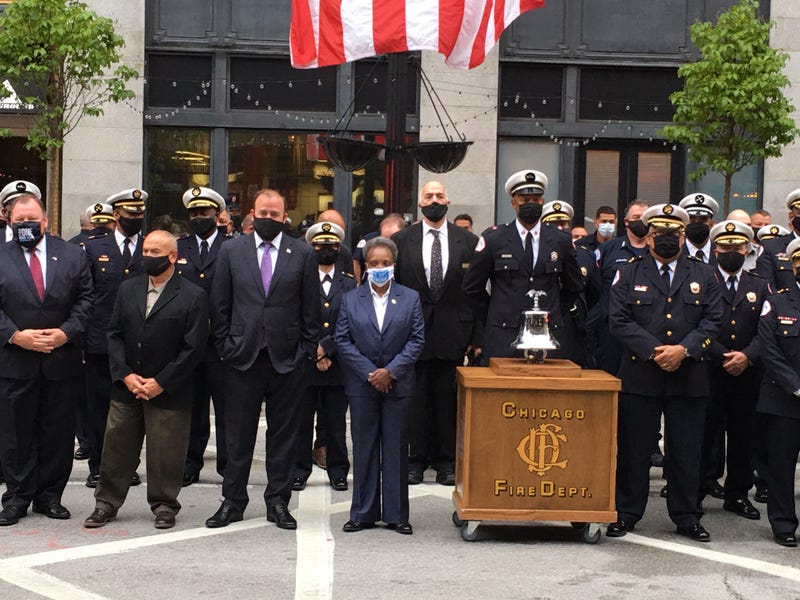 Members of the Chicago Fire Department, including some firefighters who went to New York after the 9/11 terror attacks, held a remembrance ceremony Friday in the River North neighborhood.